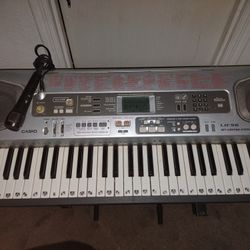Casio  LK-56 Keyboard & adjustable Stand