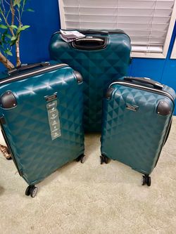 Kenneth Cole luggage set .