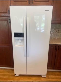 White fridge with ice and water