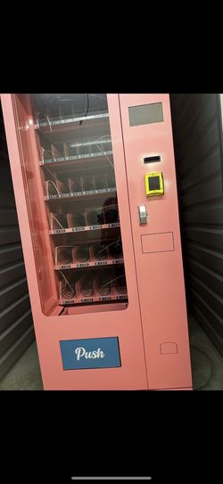 Pink Vending Machine With Keypad