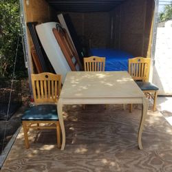 Three chairs and a dining room table 35 living room chair 25