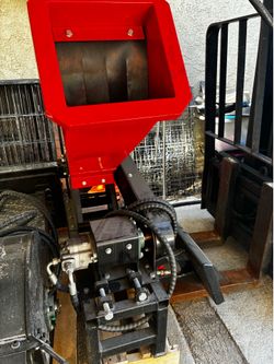 Wood chipper attachment for mini skid steer