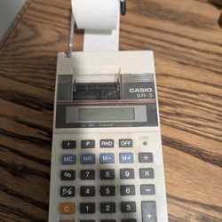 Vintage 1970s Casio printing calculator. Works perfectly. HR-10 Model. Missing Back Cover For Batteries.