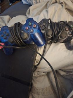 Playstation slim with 5 games