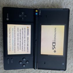 Nintendo DSI w/Charger.