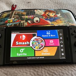 Nintendo Switch Plus 4 Games 