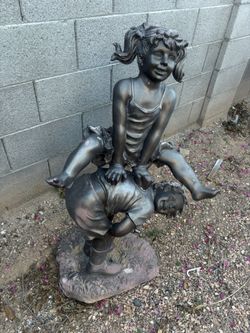 2 girls playing GARDEN DECOR