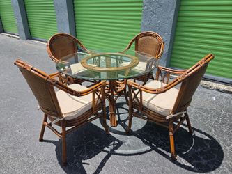 $450  OBO-VINTAGE RATTAN/BAMBOO DINING SET TABLE AND FOUR CHAIR CHAIRS