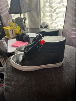 Women’s size 6.5 VANS exclusive EMPOWERING WOMENS DAY- it reads on the back “WE ALL COME FROM +”