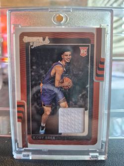 Koby Brea Panini Threads Rookie Relic Card and a Koby Brea Signature card