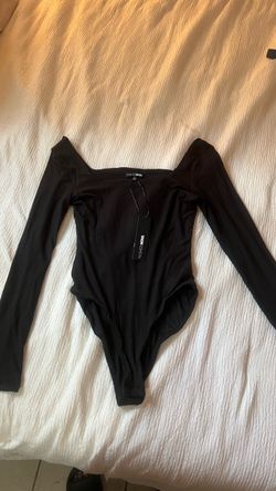 2 black/white Fashion nova bodysuits(small)