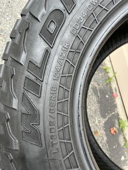 305 65 18 Tire
