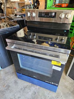 Brand new electric stove still has protective cover
