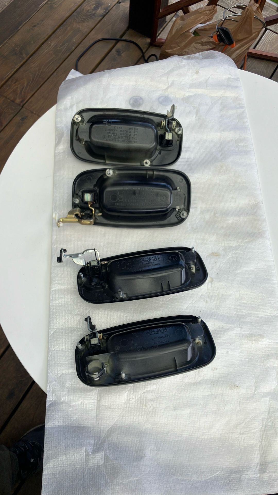 Four black 2005 Chevy Silverado door handles. Also fits other years