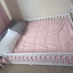 Queen Bed frame, toddler mattress and sheets