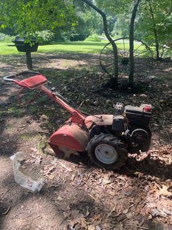 Red Gas-Powered Rear-Tine Tiller