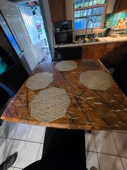 Dining room set. With 4 chairs. And utility table