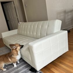 White Sofa/Futon. Can Be Made Into Bed! 