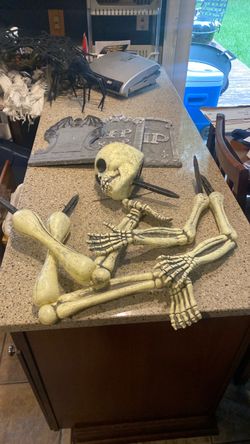 Halloween Skeleton and RIP Tombstone Decorations