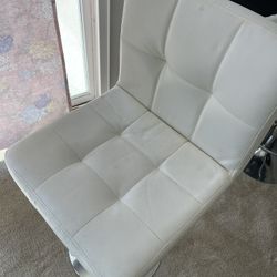 White chairs, height adjustable, 15 each, not damaged, just a little dirty.