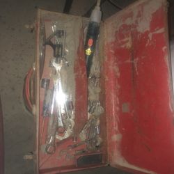 Tool chest with assorted tools inside