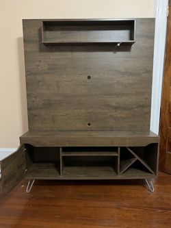 Wood Grain Entertainment Center with TV Mount Panel