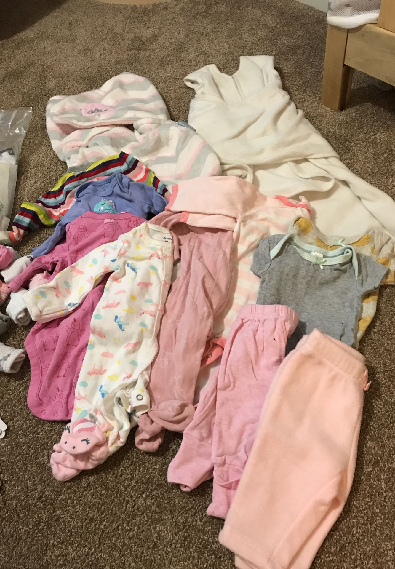 Newborn clothes, swaddles, burp cloth, hygiene goodies