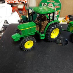 John Deere Tractor Set, Cast Iron Tractor Cast Iron Grain Wagon, Pull Behind Disc, Sold As3 Pieces,  Like New Condition  Made By Ertl