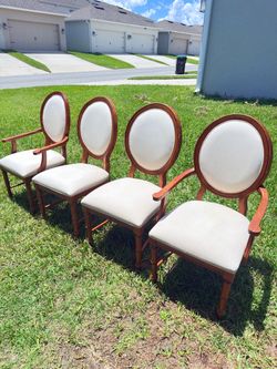 Selling 4 French Provincial-style dining chairs.