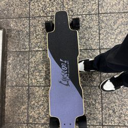 31 Mph Electric skateboard With 31mph Range.