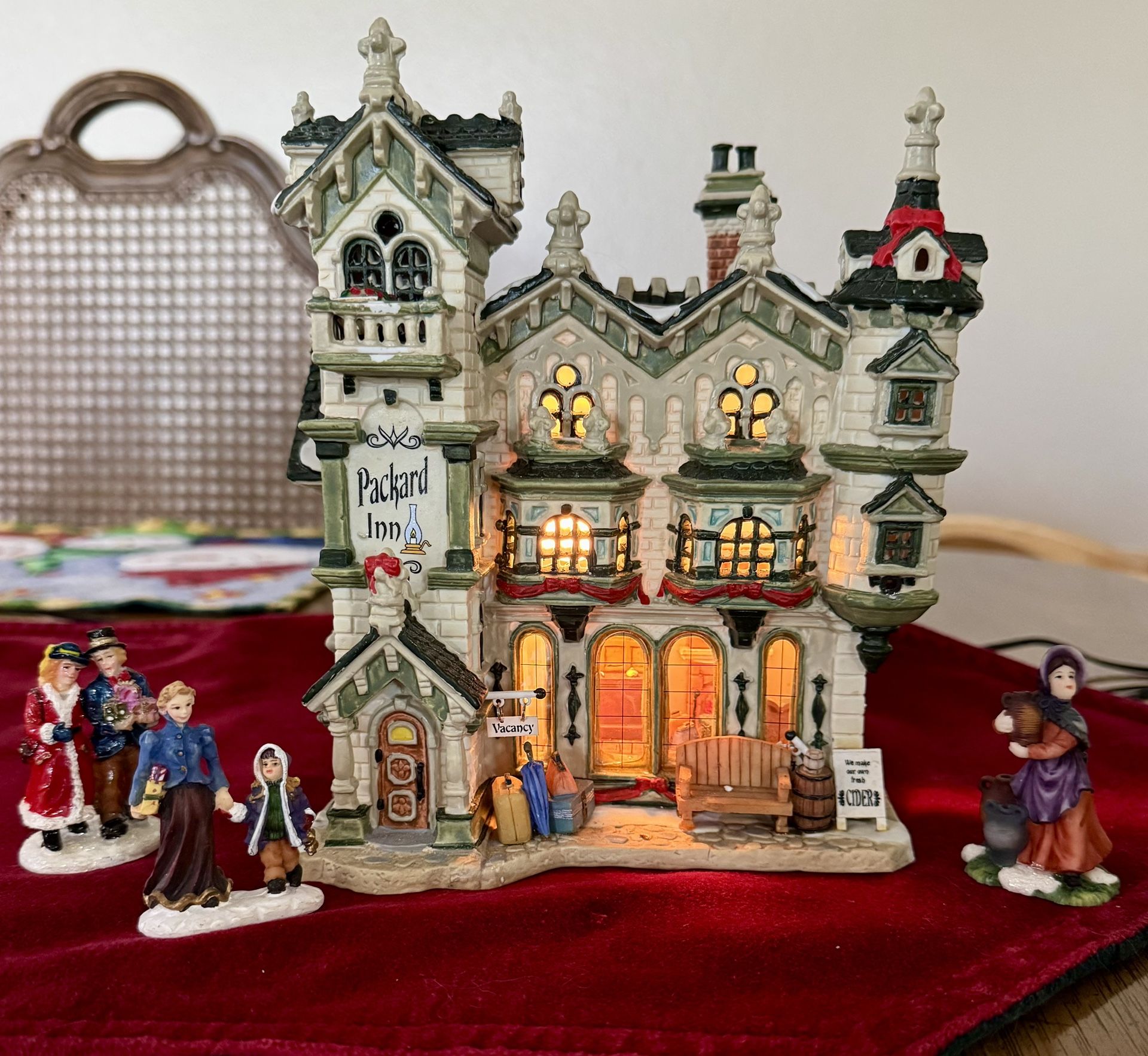 Christmas Village With Three Figurines