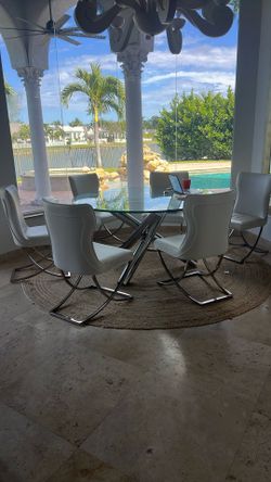 A60 Inch Round Glass And Chrome Dining Table With5 White And Chrome Chairs. Bonus 6.chair