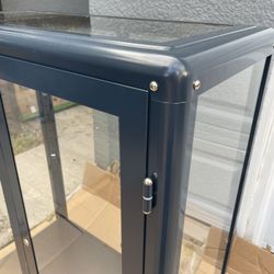 Glass  Shelved Cabinet, Wrigly, Long Beach