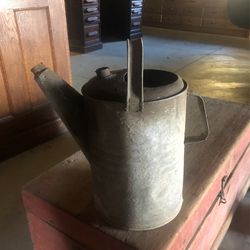 Vintage galvanized watering can