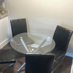 Glass Table 4 Black Chairs  Good Conditions 
