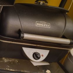 This is a Rival Crock-Pot BBQ Pit indoor electric countertop slow cooker. 
It allows for slow-cooking large cuts of meat like roasts, chickens, and ri