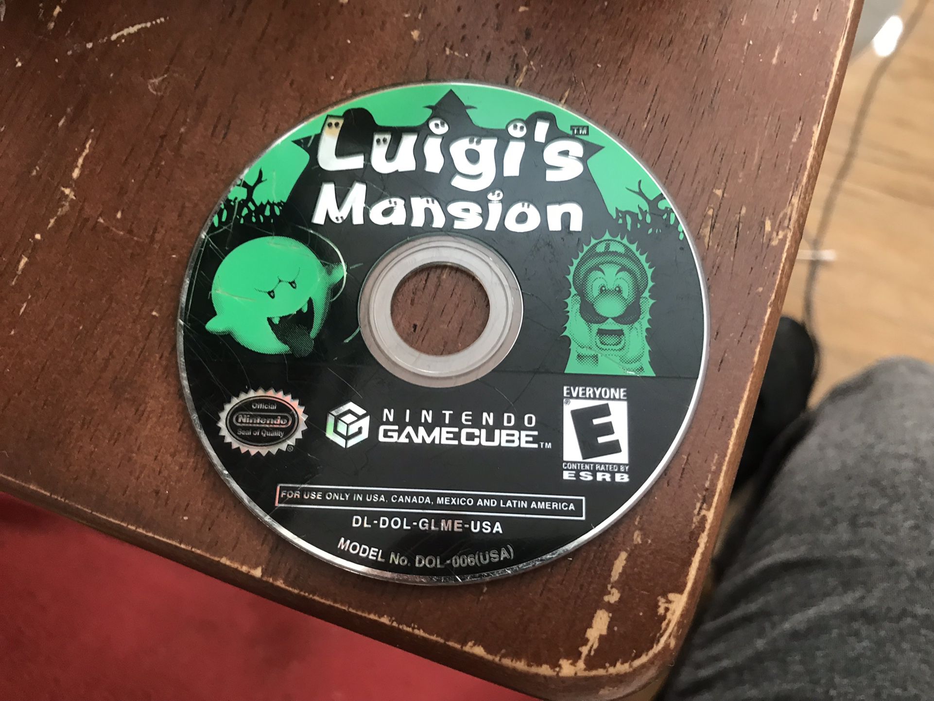 Luigi's Mansion scratched top but works
