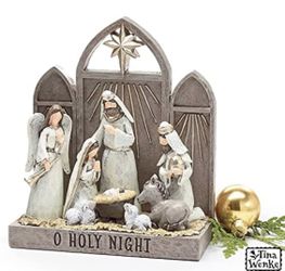Stunning one piece shelf sitter depicting a nativity scene with "O Holy Night" recessed on the front. The trifold background has a gold star at the to