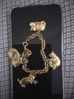 4 charmed Cat bracelet Avon vintage antique kitten charms bracelet is for a kid