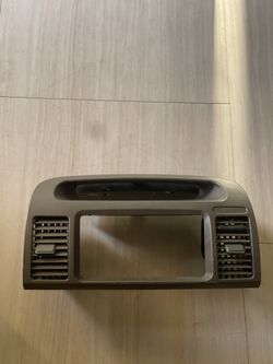 2003 Toyota Camry le stereo bezel (aftermarket)with clock