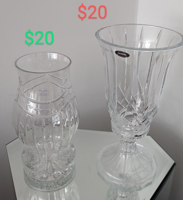 Two very beautiful crystal candle holders, both made of two pieces...one of them is new with box and Other On Exactly Like New
