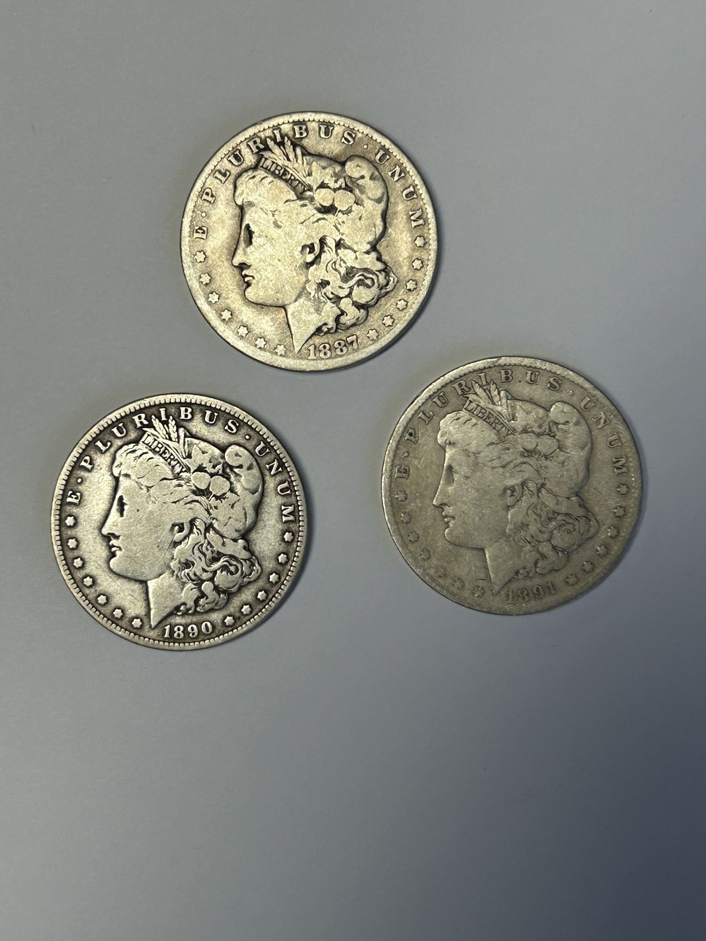 3 Morgan Silver Dollars…..$90