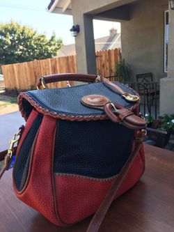Absolutely authentic “Dooneyh & bourke beautiful excellent condition.