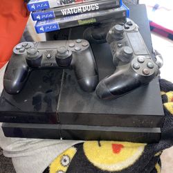PS4 With Two Controllers And Three Games