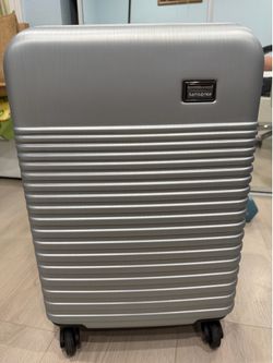 Samsonite carry on Silver luggage /suitcase