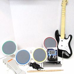 NINTENDO WII ROCK BAND BUNDLE, MIC, DRUM PAD, GUITAR, AND GAME 