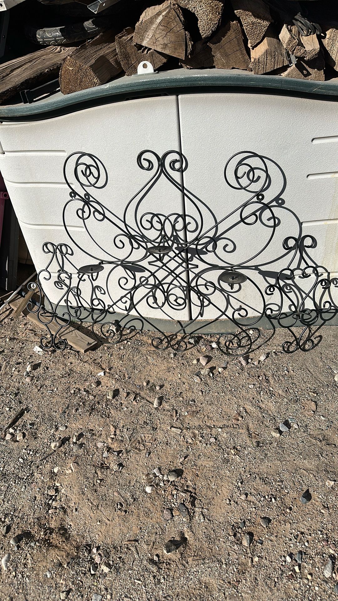 A set of three decorative candle holders