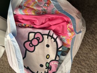 Bags Of Clothes And Toys