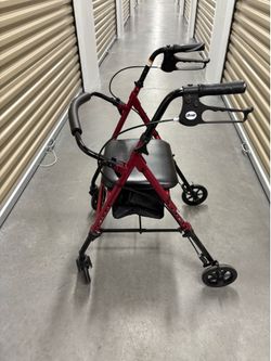 Drive -4 wheel Rollator walker with a seat and storage bag