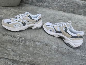 Woman's AL8 Nike running shoes size 8
